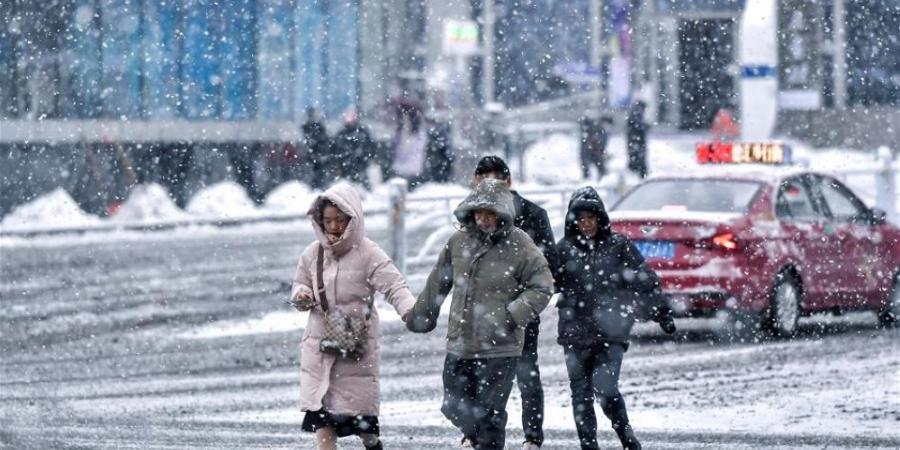 صور| الجليد يكسو شوارع مدن صينية بعد تحذير من عواصف شديدة - عرب فايف