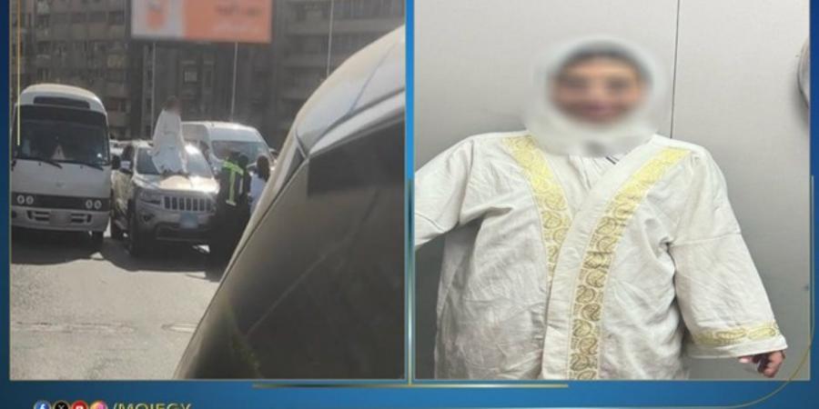 مهتزة نفسيا.. ضبط فتاة أعتلت سيارة أعلى كوبرى أكتوبر بالقاهرة - عرب فايف
